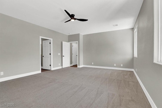 9116 Vista Greens Way Unit 104, Las Vegas, NV 89134 - unfurnished bedroom featuring carpet flooring, baseboards, and ceiling fan
