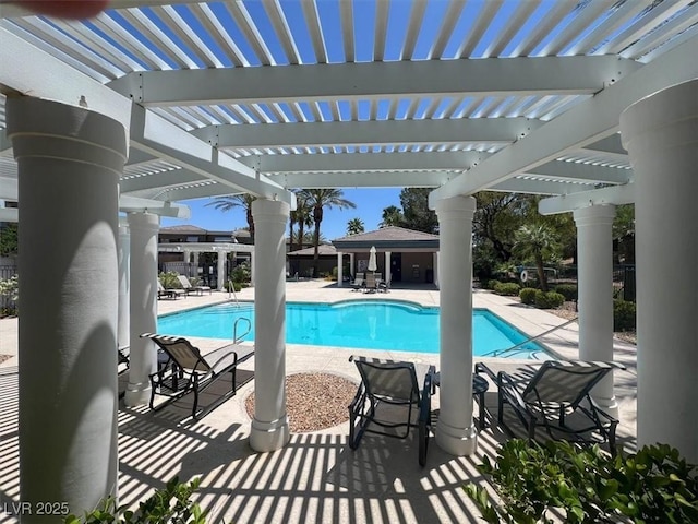 9116 Vista Greens Way Unit 104, Las Vegas, NV 89134 - community pool with a pergola and a patio