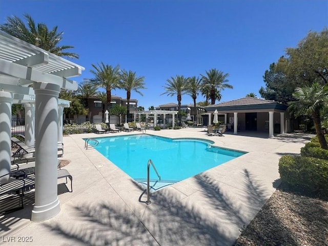 9116 Vista Greens Way Unit 104, Las Vegas, NV 89134 - community pool featuring a pergola and a patio
