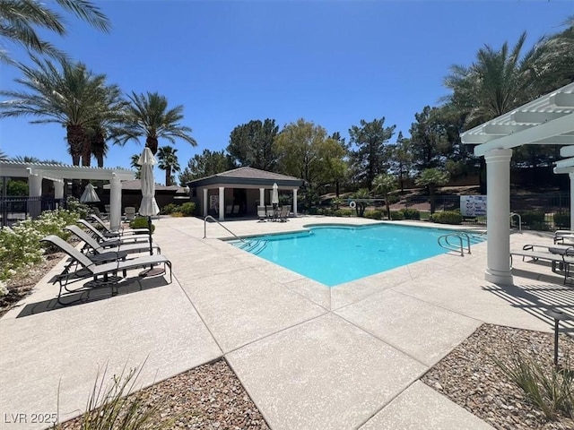 9116 Vista Greens Way Unit 104, Las Vegas, NV 89134 - community pool with a patio area and a pergola