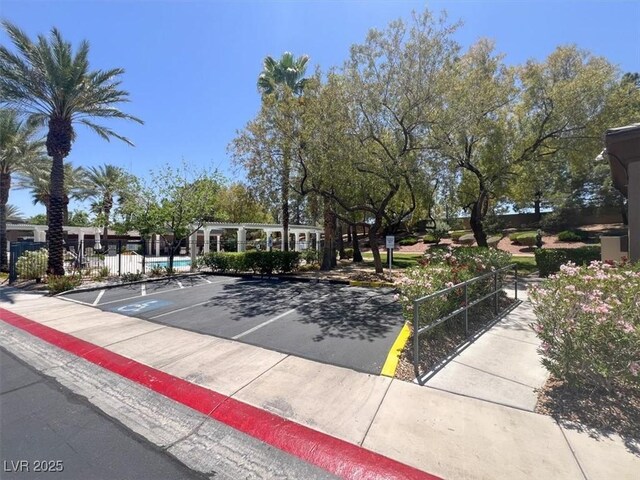 9116 Vista Greens Way Unit 104, Las Vegas, NV 89134 - view of home's community featuring uncovered parking
