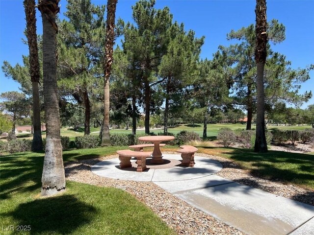 9116 Vista Greens Way Unit 104, Las Vegas, NV 89134 - view of home's community with a yard