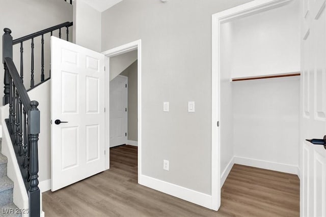 9116 Vista Greens Way Unit 104, Las Vegas, NV 89134 - unfurnished bedroom featuring wood finished floors and baseboards