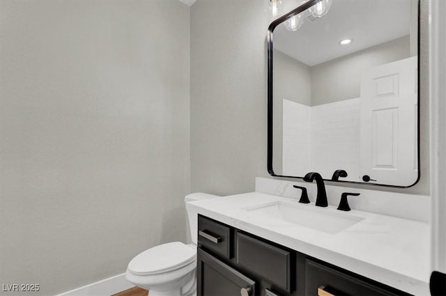 9116 Vista Greens Way Unit 104, Las Vegas, NV 89134 - bathroom with vanity, toilet, and baseboards