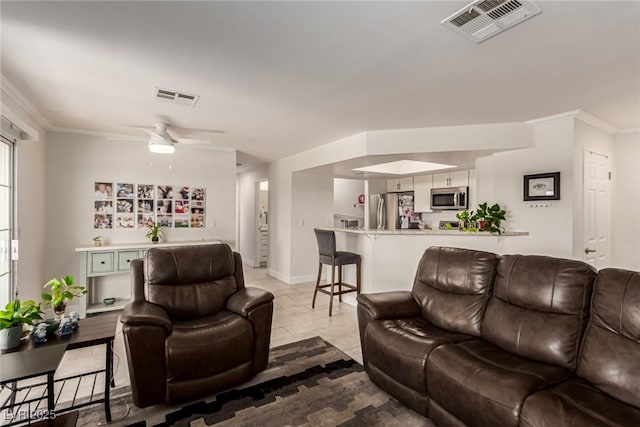 8600 W Charleston Blvd Unit 2187, Las Vegas, NV 89117 - living room featuring ceiling fan, crown molding, and baseboards
