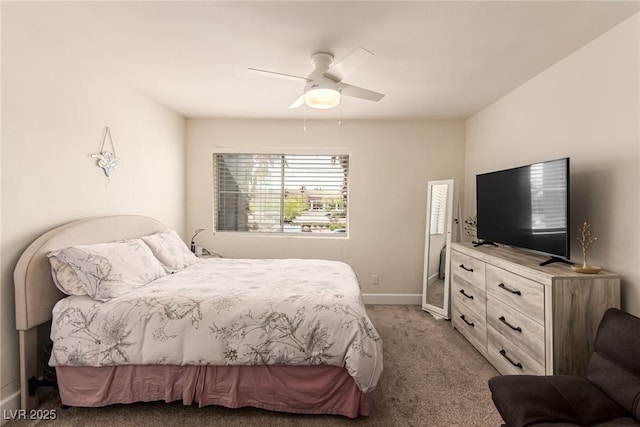 8600 W Charleston Blvd Unit 2187, Las Vegas, NV 89117 - bedroom with light carpet, baseboards, and ceiling fan