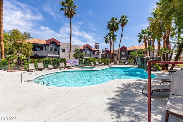 8600 W Charleston Blvd Unit 2187, Las Vegas, NV 89117 - community pool featuring a residential view, a hot tub, and a patio