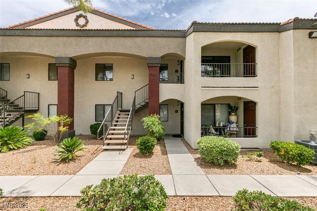 950 Seven Hills Dr Unit 524, Henderson, NV 89052 - view of front facade with stairs and stucco siding