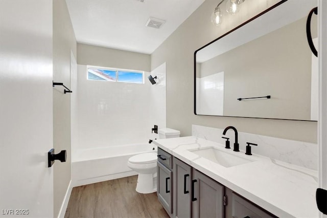 1225 Stonesthrow Cir, North Las Vegas, NV 89031 - full bath with toilet, wood finished floors, vanity, and shower / bathtub combination