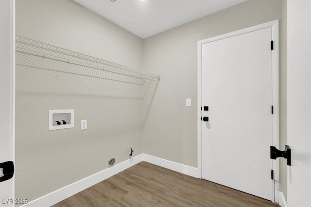 1225 Stonesthrow Cir, North Las Vegas, NV 89031 - washroom with washer hookup, wood finished floors, baseboards, and hookup for a gas dryer