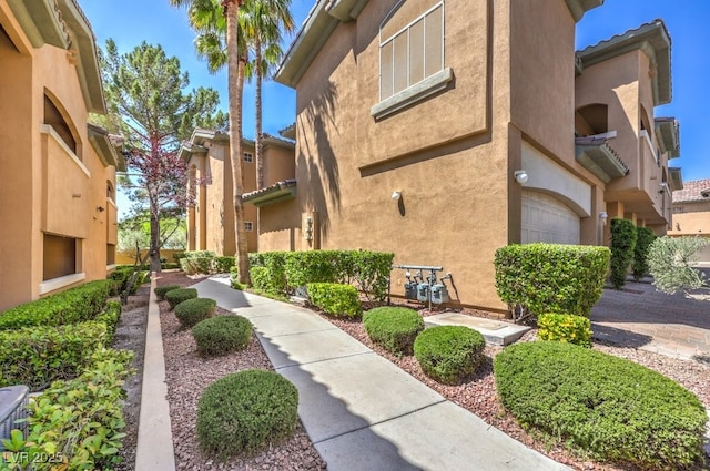 8737 Red Brook Dr Unit 204, Las Vegas, NV 89128 - view of community featuring a garage