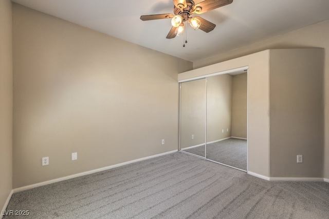 8737 Red Brook Dr Unit 204, Las Vegas, NV 89128 - unfurnished bedroom with carpet floors, baseboards, a closet, and a ceiling fan