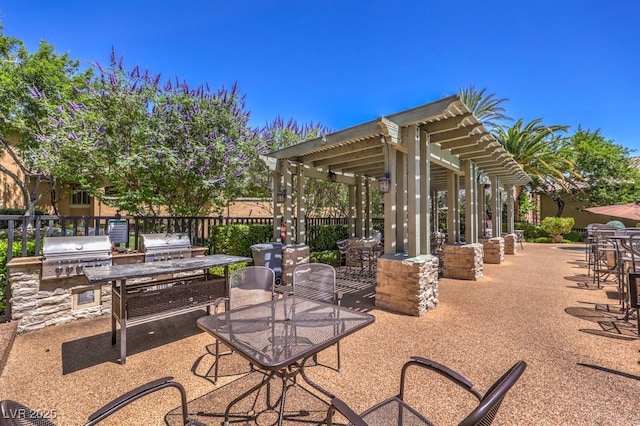8737 Red Brook Dr Unit 204, Las Vegas, NV 89128 - view of patio with outdoor dining area and a pergola