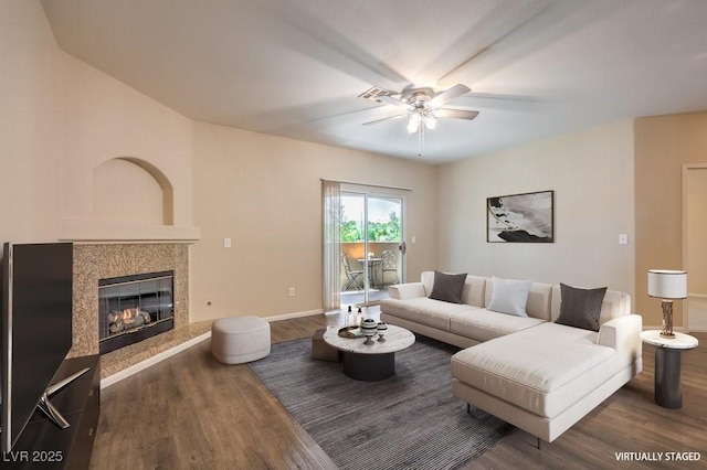 8737 Red Brook Dr Unit 204, Las Vegas, NV 89128 - living area featuring ceiling fan, wood finished floors, a premium fireplace, and baseboards