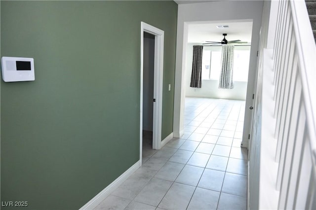 1703 Game Garden Rd, North Las Vegas, NV 89031 - hall with baseboards and light tile patterned floors