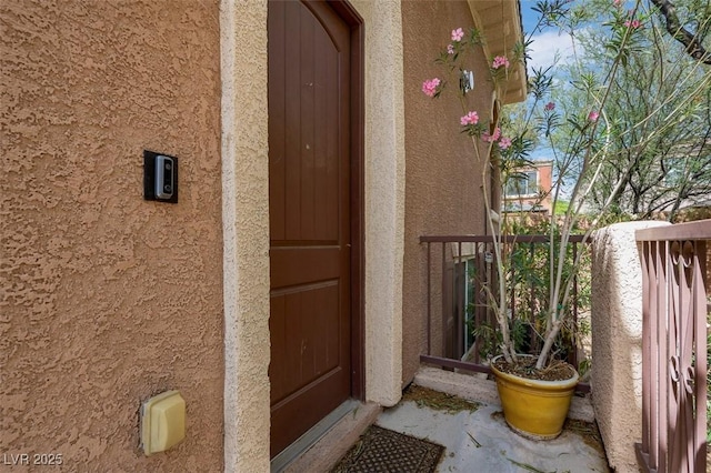 9975 Sand Key St, Las Vegas, NV 89178 - entrance to property featuring stucco siding