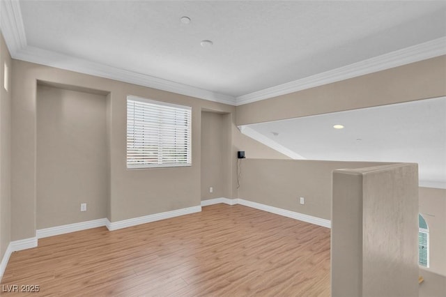 9975 Sand Key St, Las Vegas, NV 89178 - empty room with ornamental molding, light wood finished floors, and plenty of natural light