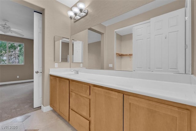 9975 Sand Key St, Las Vegas, NV 89178 - bathroom featuring vanity, a ceiling fan, and tile patterned flooring