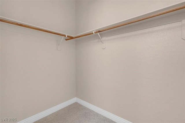 9975 Sand Key St, Las Vegas, NV 89178 - spacious closet featuring light colored carpet