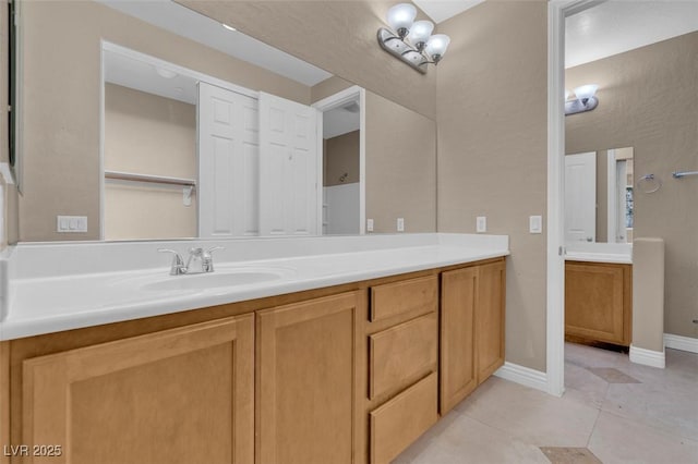 9975 Sand Key St, Las Vegas, NV 89178 - full bath featuring vanity and tile patterned floors