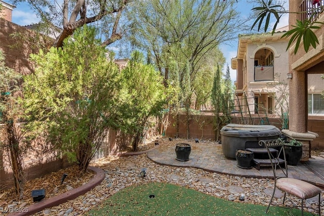 9975 Sand Key St, Las Vegas, NV 89178 - view of yard with a hot tub and a patio