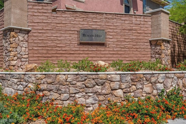 9975 Sand Key St, Las Vegas, NV 89178 - view of property exterior featuring stone siding