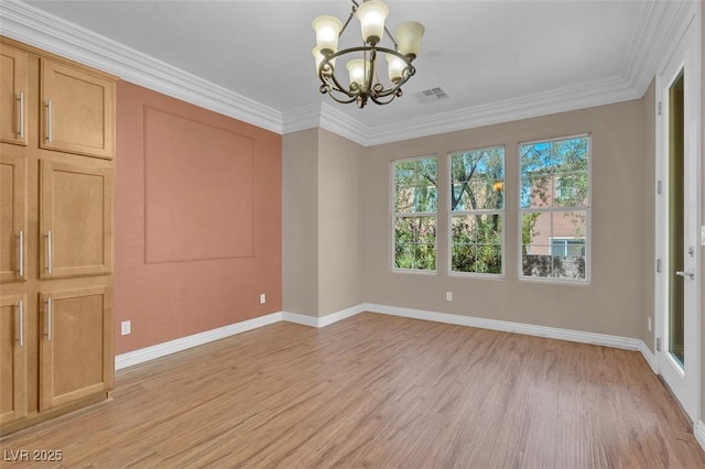 9975 Sand Key St, Las Vegas, NV 89178 - spare room with a chandelier, light wood-style floors, and crown molding