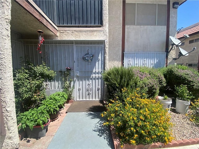 1748 Jupiter Ct Unit C, Las Vegas, NV 89119 - property entrance featuring a gate