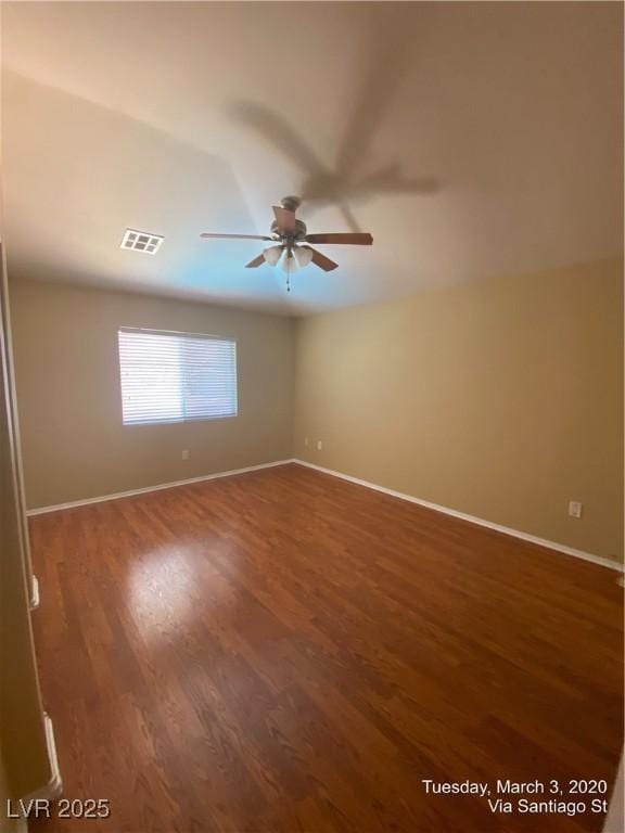 533 Via Santiago St, Las Vegas, NV 89144 - empty room featuring a ceiling fan, wood finished floors, and baseboards