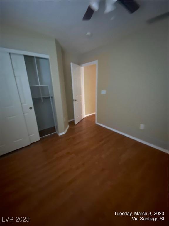 533 Via Santiago St, Las Vegas, NV 89144 - unfurnished bedroom with wood finished floors, baseboards, a closet, and ceiling fan