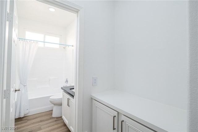 669 Elliot Peak Ave, Las Vegas, NV 89183 - full bath with vanity, toilet, shower / tub combo, and wood finished floors