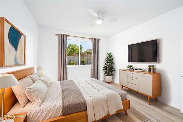 669 Elliot Peak Ave, Las Vegas, NV 89183 - bedroom featuring light wood-style flooring, baseboards, and ceiling fan