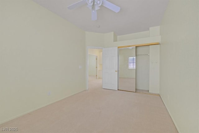 9746 Driftwood Island Ct, Las Vegas, NV 89148 - unfurnished bedroom with light carpet, ceiling fan, a closet, and baseboards
