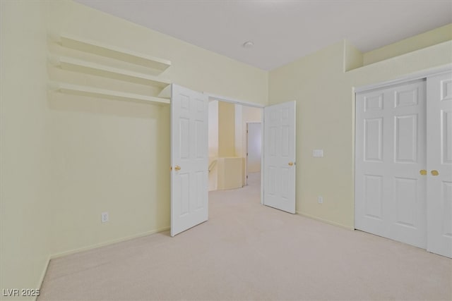 9746 Driftwood Island Ct, Las Vegas, NV 89148 - unfurnished bedroom with light carpet, a closet, and baseboards