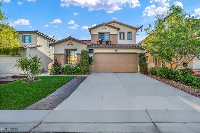 5553 Coral Gate St, Las Vegas, NV 89148 - mediterranean / spanish house with stucco siding, concrete driveway, a garage, a front yard, and a tiled roof