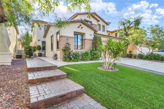 5553 Coral Gate St, Las Vegas, NV 89148 - mediterranean / spanish home with central AC, stucco siding, and a front yard