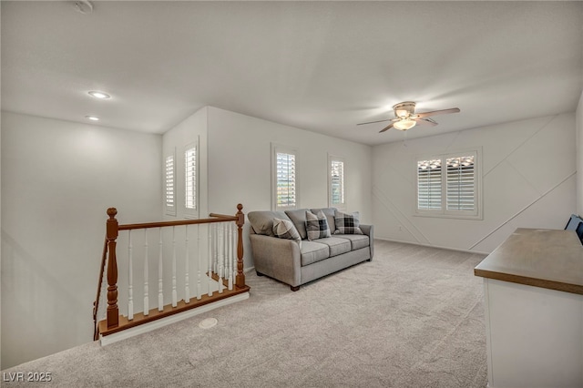 5553 Coral Gate St, Las Vegas, NV 89148 - living room featuring light carpet, a ceiling fan, and recessed lighting