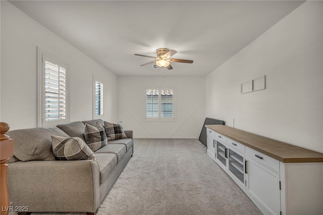 5553 Coral Gate St, Las Vegas, NV 89148 - carpeted living area featuring ceiling fan
