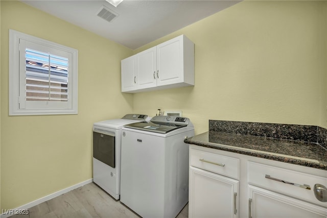 5553 Coral Gate St, Las Vegas, NV 89148 - laundry room with separate washer and dryer, cabinet space, baseboards, and light wood-style flooring