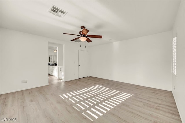 5553 Coral Gate St, Las Vegas, NV 89148 - spare room featuring wood finished floors, a ceiling fan, and baseboards