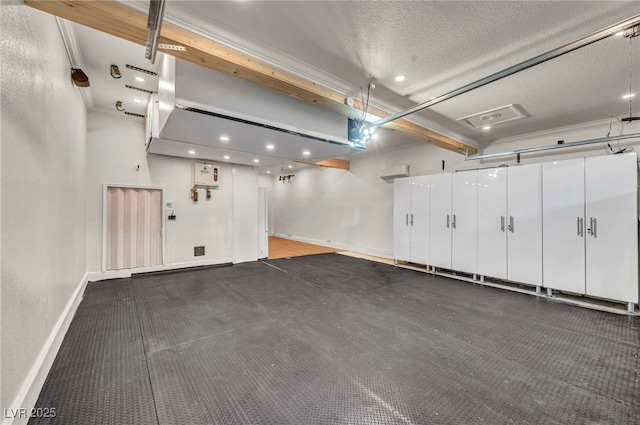 5553 Coral Gate St, Las Vegas, NV 89148 - garage with baseboards and recessed lighting