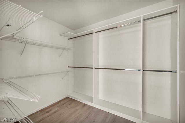 5553 Coral Gate St, Las Vegas, NV 89148 - spacious closet with wood finished floors