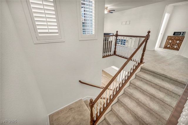 5553 Coral Gate St, Las Vegas, NV 89148 - staircase featuring carpet and a ceiling fan