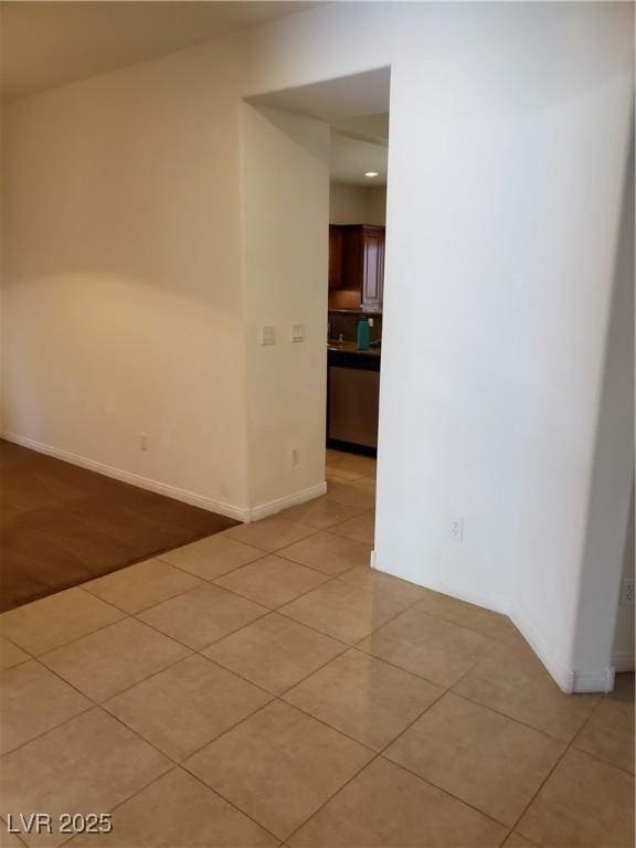 8550 Bright Bush St, Las Vegas, NV 89131 - tiled empty room featuring baseboards