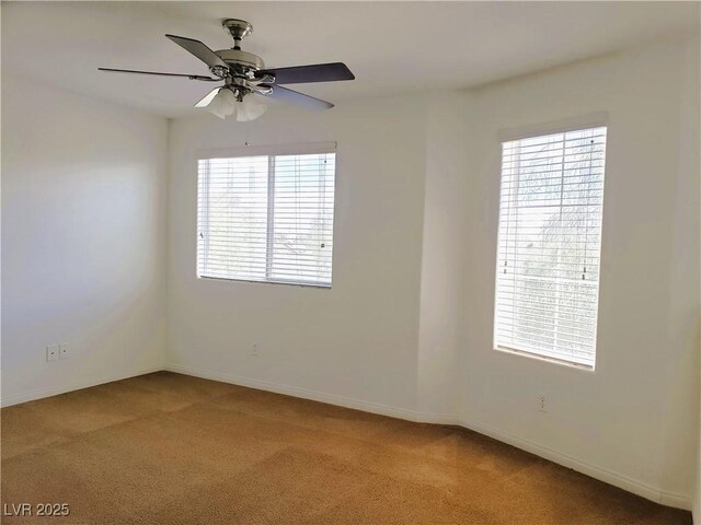 8550 Bright Bush St, Las Vegas, NV 89131 - empty room featuring light carpet, baseboards, and ceiling fan