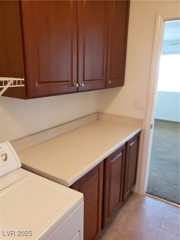 8550 Bright Bush St, Las Vegas, NV 89131 - laundry room featuring washer / clothes dryer, cabinet space, and light carpet