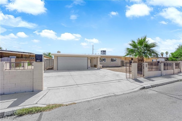 1628 Patricia St, North Las Vegas, NV 89030 - single story home with driveway, a gate, and a fenced front yard