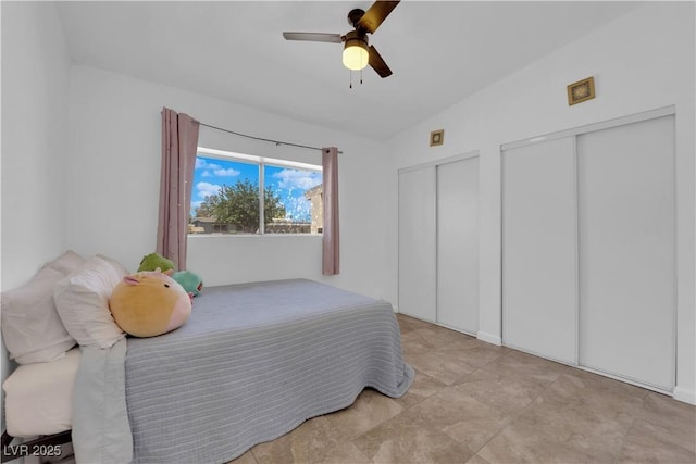 1628 Patricia St, North Las Vegas, NV 89030 - bedroom featuring two closets and a ceiling fan