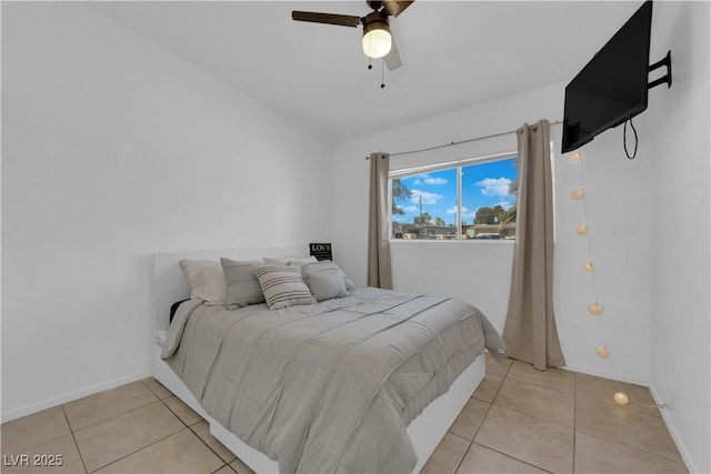 1628 Patricia St, North Las Vegas, NV 89030 - bedroom with light tile patterned flooring, baseboards, and ceiling fan
