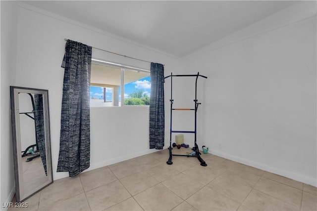 1628 Patricia St, North Las Vegas, NV 89030 - workout area with ornamental molding, baseboards, and tile patterned flooring